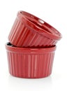 Red ceramic ramekins on white Royalty Free Stock Photo