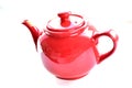 Red ceramic teapot on white background Royalty Free Stock Photo