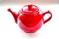 Red ceramic teapot on white background Royalty Free Stock Photo