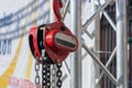 Red chain winch close up sunny day Royalty Free Stock Photo