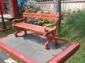 Red park chair on the beauty park space Royalty Free Stock Photo