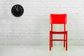 Red chair with clock Royalty Free Stock Photo