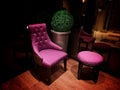 The red chair is in a dark room. Royalty Free Stock Photo
