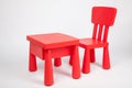 Red chair and red table for children in kindergarten preschool classroom Royalty Free Stock Photo