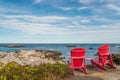 Red chairs facing Keji Seaside beach (South Shore, Nova Scotia,