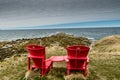 Red chairs at Green Point. Gros Morne National Park Newfoundland Canada