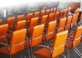 red chairs in ordinary empty waiting room. Selective focus Royalty Free Stock Photo