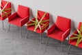 Red chairs with tape top view, social distancing