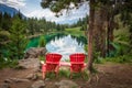 Red chairs at The Third Lake of the Valley of the Five Lakes, Jasper National Park, Canada