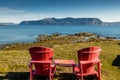 Red chairs and view from Yellow Point. Gros Morne National Park Newfoundland Canada