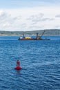 Red Channel Marker and Working Barge