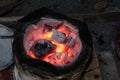 Red charcoal fuel is ignited in the furnace. Royalty Free Stock Photo