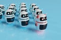 Red chatbot robot leading white robots on blue background 3D rendering Royalty Free Stock Photo