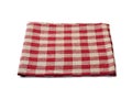 Red checkered folded textile napkin on white background Royalty Free Stock Photo