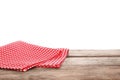 Red checkered napkins on wooden table against white background Royalty Free Stock Photo