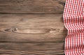 Red checkered picnic cloth on wooden background,food design tabletop,backdrop