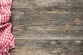 Red checkered picnic textile on rustic wooden planks background Royalty Free Stock Photo