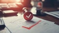 Red checkmark validates document on office desk Royalty Free Stock Photo