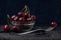 Red cherries on dark background. Heap of juicy wet cherries. Dessert concept Royalty Free Stock Photo