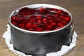 Red cherry cake in baking tin Royalty Free Stock Photo