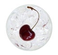 Red cherry on ice cubes in a glass top view isolated on white ba Royalty Free Stock Photo