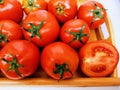 Red cherry tomatoes fruit vine tomato vegetable 
tamaatar tomat timatar pomidor tomate closeup view image photo Royalty Free Stock Photo