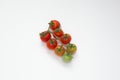 Red cherry tomatoes isolated on a white background