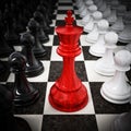 Red chess king standing between white and black pawns. 3D illustration Royalty Free Stock Photo