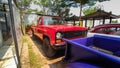 Red Chevrolet C20 pickup truck in a parking lot Royalty Free Stock Photo