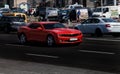 Red Chevrolet Camaro in city Royalty Free Stock Photo