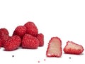 red chewing sweets in the form of berries. Sweets in the form of raspberries on a white background. Marmalade isolate. Sliced
