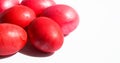 Red chicken eggs on a white background. Easter holiday. Royalty Free Stock Photo