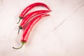 red Chile on white marble table/red Chile on white marble background. Top view. Copy space