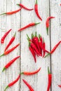 red chili or chilli cayenne pepper on white wooden table Royalty Free Stock Photo