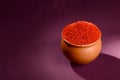 Red Chili Pepper powder in clay pot Royalty Free Stock Photo