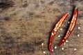 Red chili pepper sliced on wooden chopping board. Royalty Free Stock Photo