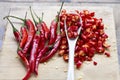 Red chili pepper sliced on wooden chopping board. Royalty Free Stock Photo