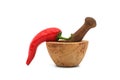 Red chili pepper and wooden pestle with mortar Royalty Free Stock Photo