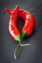 Red Chili Peppers on Black Slate Royalty Free Stock Photo