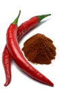 Red chili peppers and chili powder Royalty Free Stock Photo