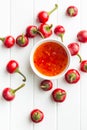Red chili peppers and chili sauce. Royalty Free Stock Photo