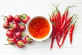 Red chili peppers and chili sauce. Royalty Free Stock Photo