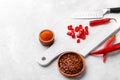 Red chili peppers, flakes and powder Royalty Free Stock Photo