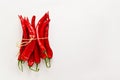 Red chili peppers on light gray wood background. Hot spicy food ingredient Royalty Free Stock Photo