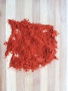 Red chili peppers powder heap Royalty Free Stock Photo
