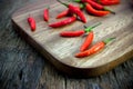 Red chili Peppers on wood chopping Royalty Free Stock Photo