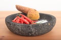 Red chilli paprikas and salt in mortar Royalty Free Stock Photo