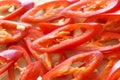 Red Chilli Pepper Slices Organic Spicy Herb Texture Background.