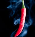 Red chilli pepper with smoke Royalty Free Stock Photo
