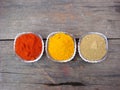 Red chilli, turmeric and coriander powder in bowl Royalty Free Stock Photo